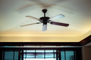 ceiling fan showing that the direction of your ceiling fan can make a difference in the temperature of your home