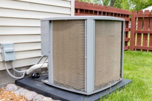 dirty outdoor HVAC unit needs to be cleaned to work properly